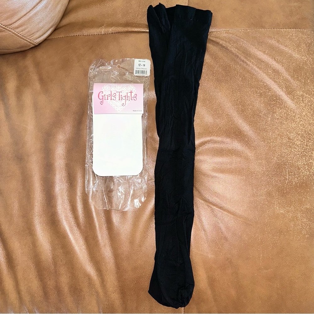 New in the package black tights. It says 12-14 (inseam 17”) - Picture 3 of 5